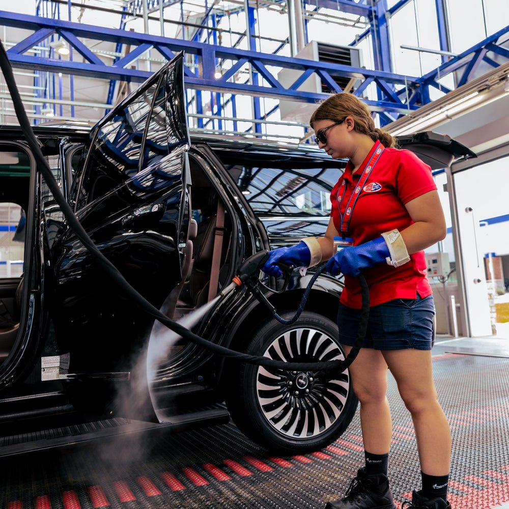 Delta Sonic employee performing Express Interior service