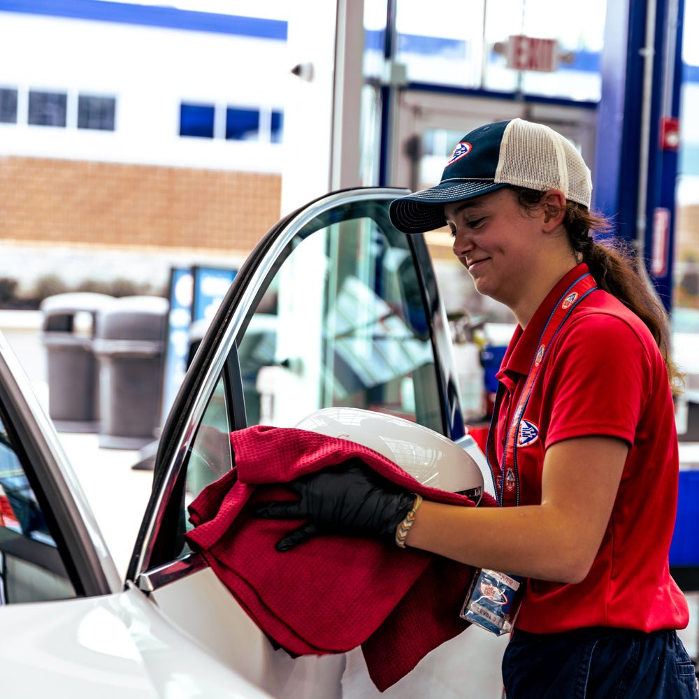 Delta Sonic employee performing Exterior Detail