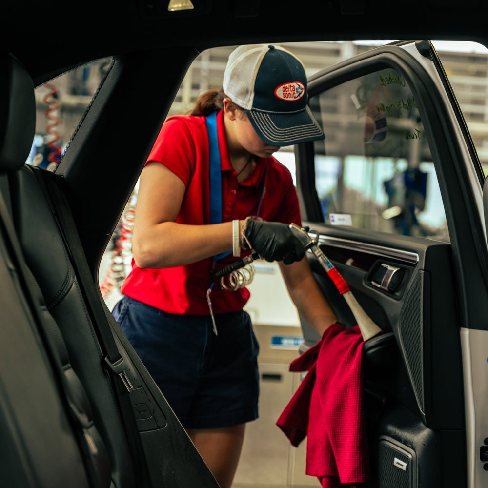 Delta Sonic employee performing Interior Detail