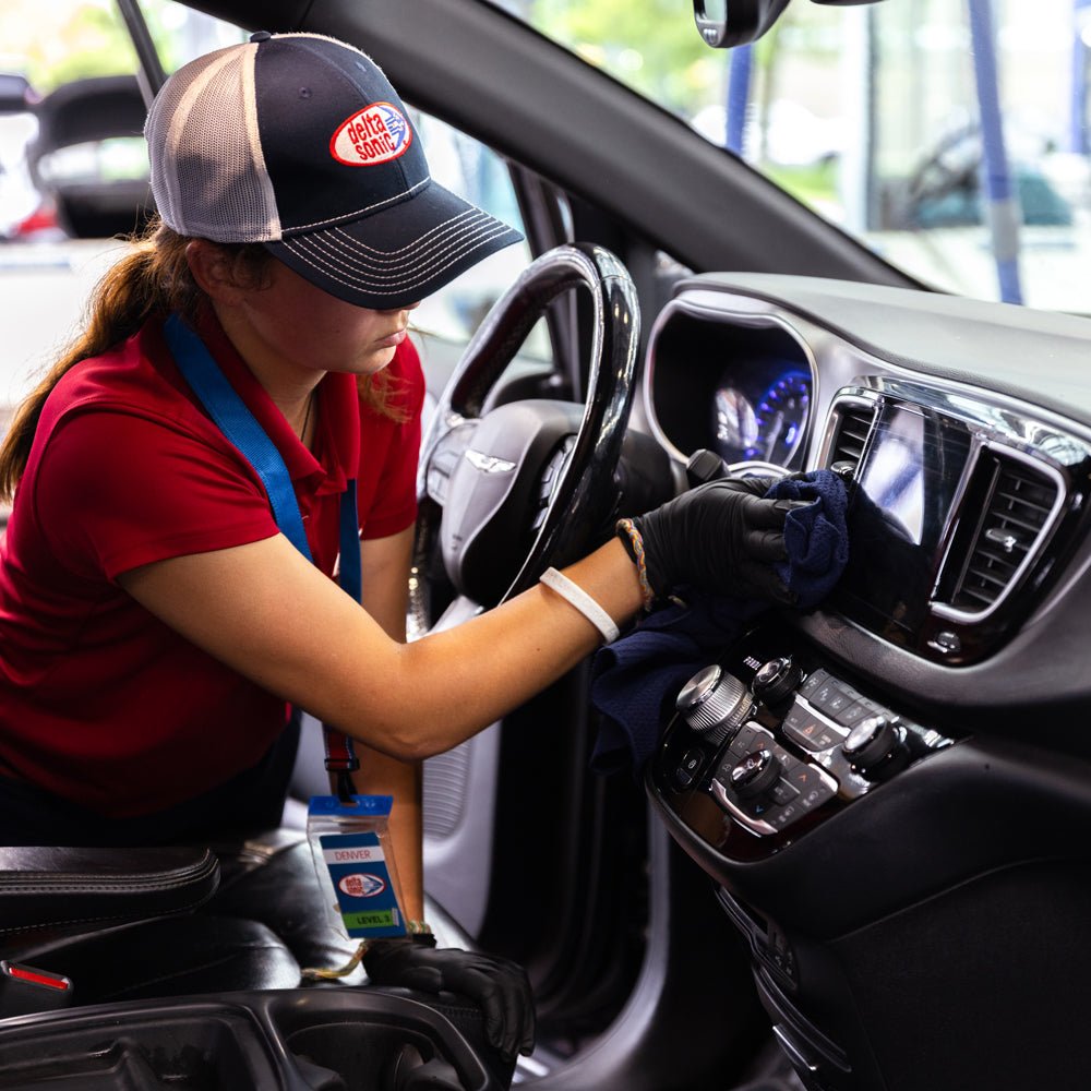 Delta Sonic employee performing Interior Detail